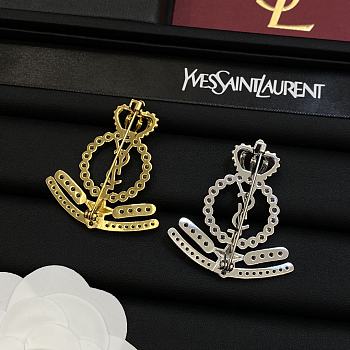 Yves Saint Laurent's new brooch