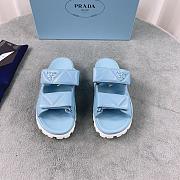 Prada Logo Plaque Quilted Slides In Blue - 1