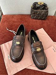 Miumiu Vintage Effect Leather Penny Loafers Ebony - 1