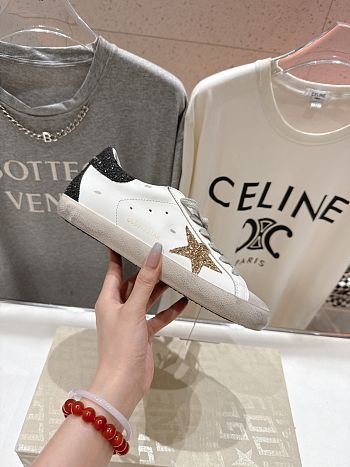 Golden Goose Super Star In Nappa Leather With Gold Glitter Star And Black Glitter Heel Tab