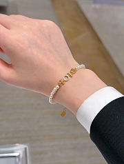 Dio(r)evolution Bracelet Gold Finish Metal and White Resin Pearls - 1
