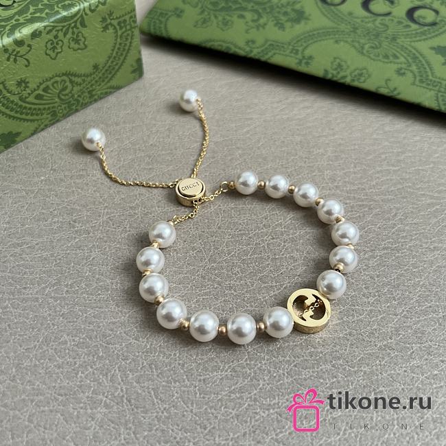 Gucci Interlocking Pearl Bracelet in Light Gold Toned Brass - 1