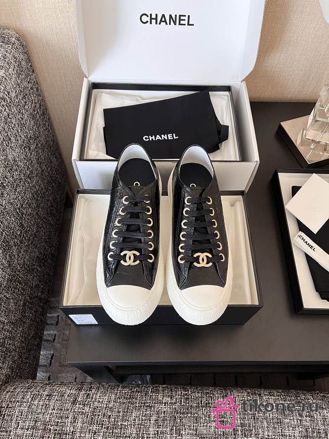 Chanel Black Calfskin Sneakers with Gold CC Logo - 1
