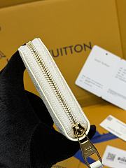 LV Zippy Wallet Monogram Empreinte Milky White/ Blue M28131 - 19.5x10.5x2.5cm - 3