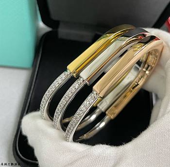 Tiffany Lock Bangle in Yellow/Rose/White and White Gold with Half Pavé Diamonds