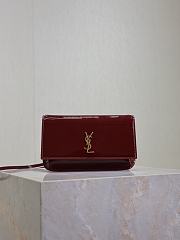 YSL Cassandre Phone Holder In Patent Leather In Burgundy - 18.5x11x2.5cm - 1