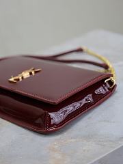 YSL Cassandre Phone Holder In Patent Leather In Burgundy - 18.5x11x2.5cm - 2