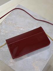 YSL Cassandre Phone Holder In Patent Leather In Burgundy - 18.5x11x2.5cm - 4
