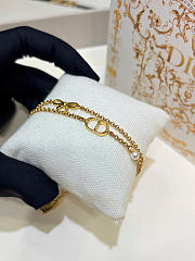 Dior CD Mini Bow Bracelet Gold-Finish Metal and White Resin Pearl B3414WOMRS_D301 - 6