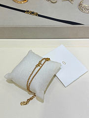 Dior CD Mini Bow Bracelet Gold-Finish Metal and White Resin Pearl B3414WOMRS_D301 - 3