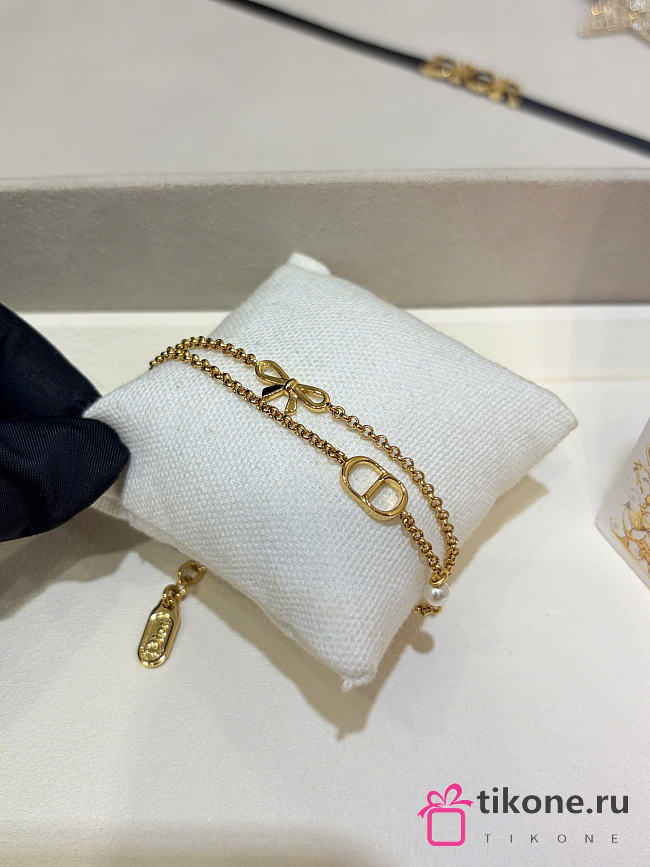 Dior CD Mini Bow Bracelet Gold-Finish Metal and White Resin Pearl B3414WOMRS_D301 - 1