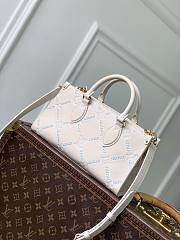 LV OnTheGo East West Monogram Empreinte Quartz Couture M29487 - 25x13x10cm - 1