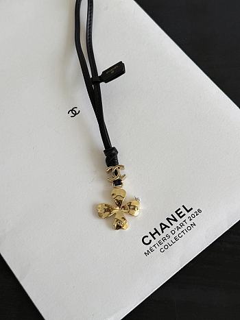 Chanel Mini Bag Charm Gold-Tone Metal & Lambskin, Golden & Black