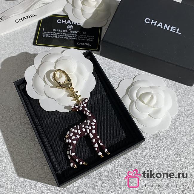 Chanel Bag Charm Metal & Resin Golden, Brown & White  - 1