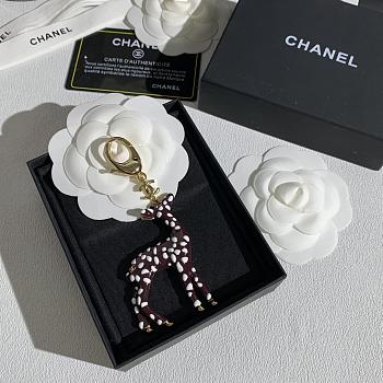 Chanel Bag Charm Metal & Resin Golden, Brown & White 