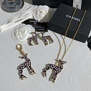 Chanel Bag Charm Metal & Resin Golden, Brown & White  - 6