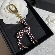 Chanel Bag Charm Metal & Resin Golden, Brown & White  - 4