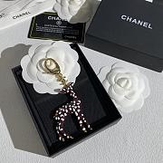Chanel Bag Charm Metal & Resin Golden, Brown & White  - 2